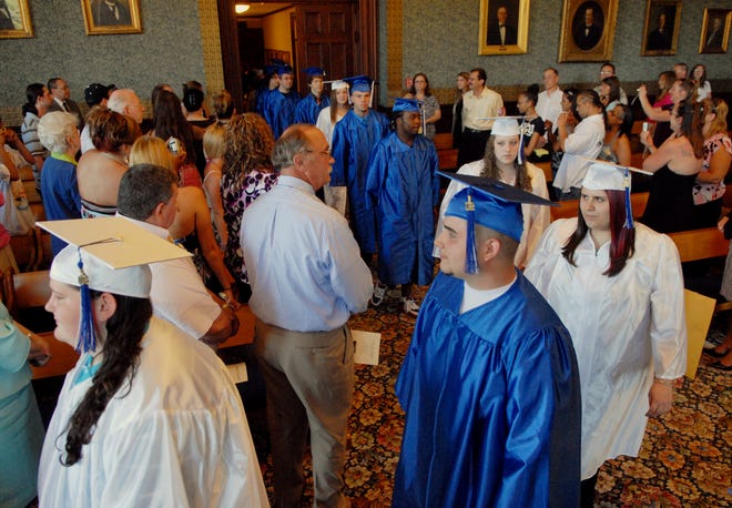 Destinee Bouchard, left, Corey Bray, Tiffany Hebert, Kristy Lorentz, Anthony Meeks and fellow Thames River Academy graduates enter Norwich City Hall Council Chambers Thursday, June 12, 2008 for commencement exercises.