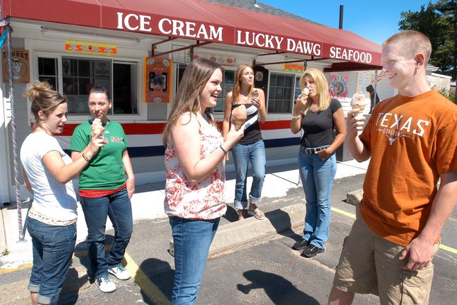 Employees and family enjoy an ice cream at the Lucky Dawg Tavern and Grille on Mattakeesett Street in Pembroke. The family-style restaurant and takeout ice cream shop replaced Hosea’s.