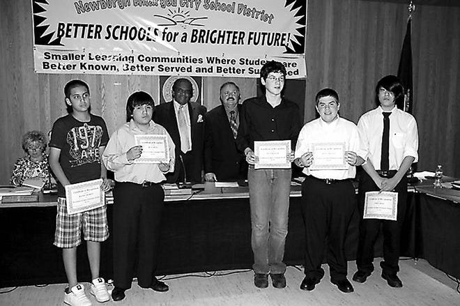 South Junior High debate team students recognized included Matt Challes, Chris Irish, Devin Kasinki, Rene Mejia and Baasil Shariff. Absent from the photo is team member Justin Rodriguez.