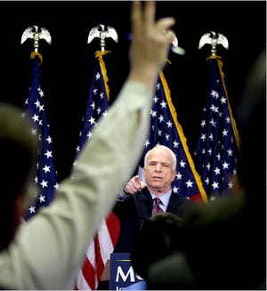 Senator John McCain of Arizona answered questions at a news conference on Monday at his campaign headquarters in Arlington, Va. He has reversed himself on some policy issues.