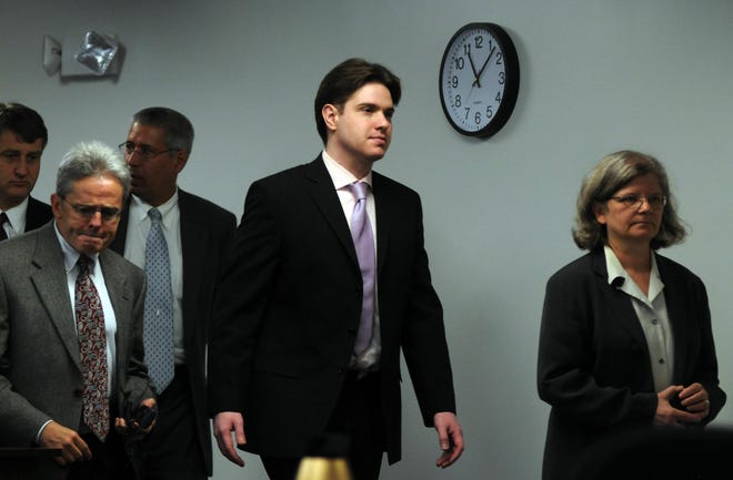 Neil Entwistle returns with his lawyers from a sidebar during the trial at Middlesex Superior Court on 6/17/08.