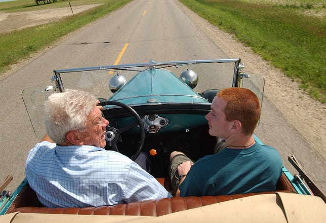 Lloyd Kaper, left, and Christopher Walto take a ride in Kaper's 1929 Ford Roadster Thursday afternoon. Kaper is Walto's Big Brother through Big Brothers Big Sisters and has been awarded the 2008 Big Brother of the Year out of 400 other agencies.