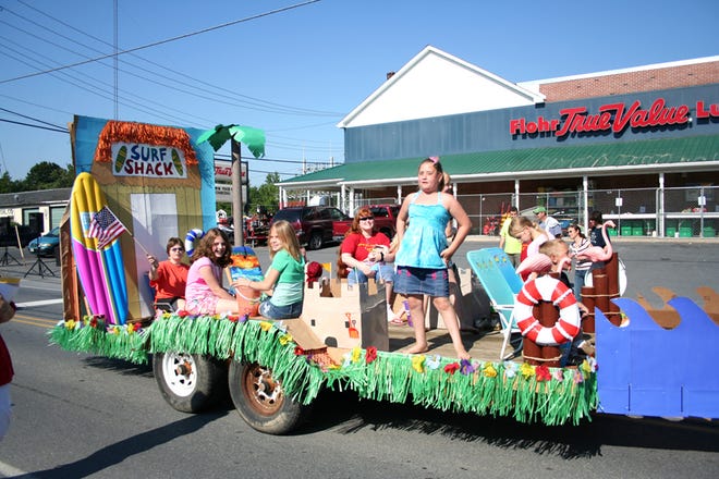 Children from St. Stephen’s Church delighted Mountain Top Heritage Days parade-goers with their colorful Surf Shack float.