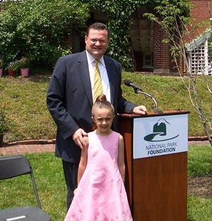 House Minority Leader Brad Jones, R-North Reading, and his daughter in Boston.