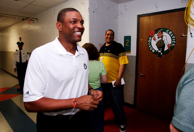 Celtics coach Doc Rivers is all smiles after Boston drafted J.R. Giddens on Thursday night.