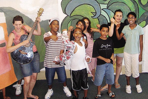 Youngsters from Carney Academy in New Bedford will present an original play as part of "Dream Out Loud" at the Zeiterion Performing Arts Center Sunday. Director Marcy Gregoire accompanies them on guitar.
