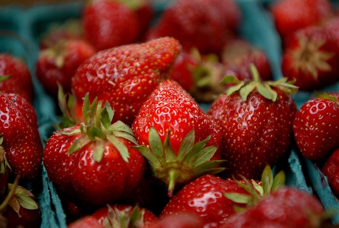 These strawberries were among the items for sale at the farmers' market on the Franklin Town Common on Friday.