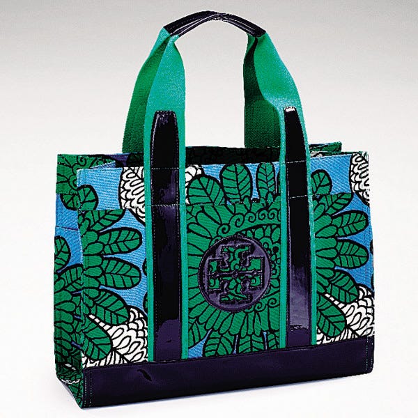 Tory Burch/The Associated Press
The Printed Tory Tote in Green Tuscan is a perfect carryall for your wipes, fan, mister and pads, along with a travel-sized deodorant and a bottle of Febreze fabric freshener.