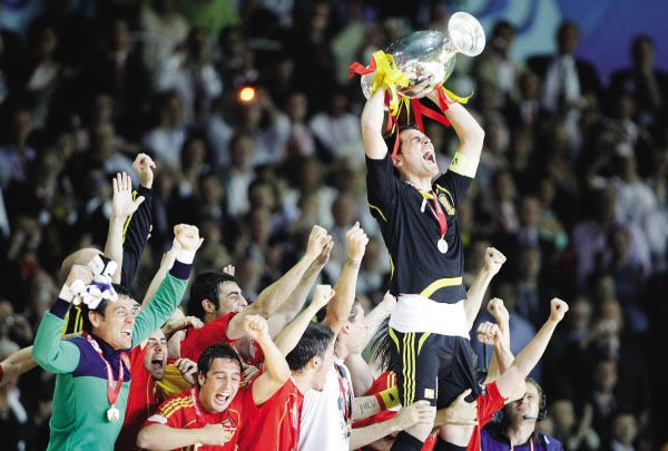 FRANK AUGSTEIN/The Associated Press
Spain’s Iker Casillas hoists the trophy as his team celebrates the Euro 2008 championship, Spain’s first Euro title in 44 years.