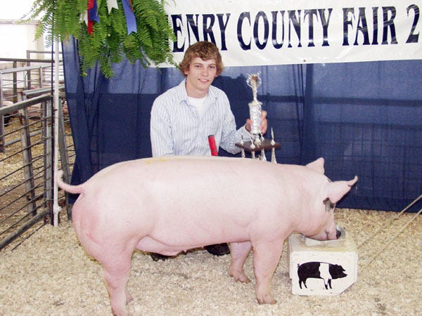 Heath Rakestraw?of Annawan showed the grand champion barrow in the junior swine show on Thursday, June 26, at the Henry County Fair.