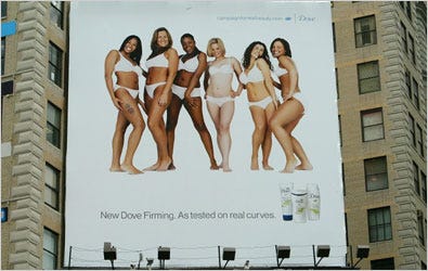 A Dove billboard with the "real" looking women models.
