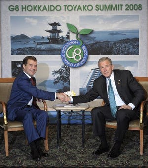 U.S. President George W. Bush shakes hands with Russian President Dmitry Medvedev during a bilateral meeting at the G-8 summit Monday in the lakeside resort of Toyako on Japan's northern main island of Hokkaido.