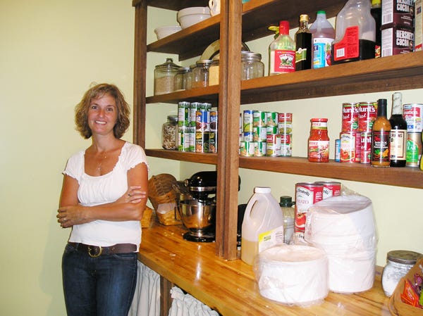 Christie Schilling of Geneseo is show in her home’s well-stocked pantry.