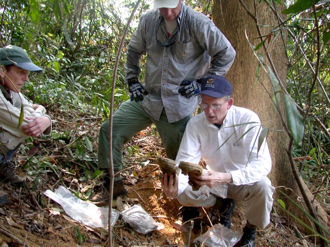 Former U.S. Rep. Rob Simmons visits an excavation site in 2003 west of Hue, Vietnam, looking for the remains of Army Capt. Arnold E. Holm Jr. of Waterford and his helicopter crew. Holm was shot down in 1972.