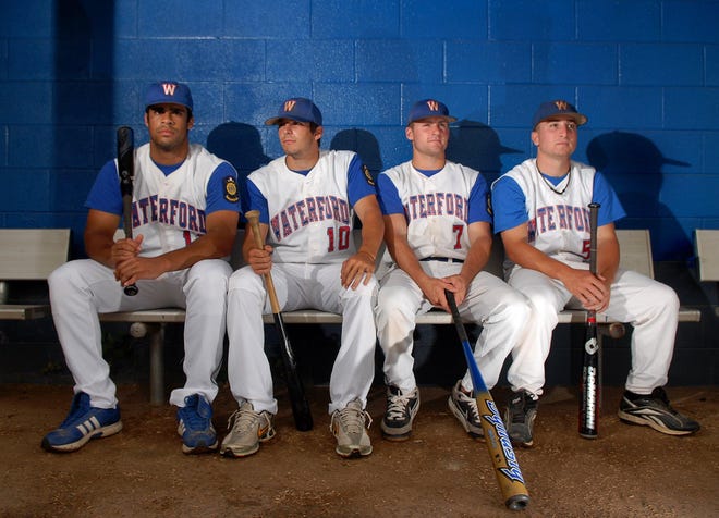 A portrait of Waterford baseball players, from left, Pat Epps, Jake Simon, Mickie Amanti and Ben Farina, in the Waterford High School dugout.