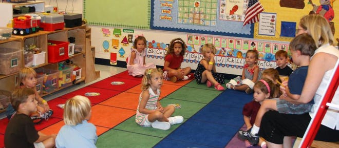 Beverly Browning welcomes her new pre-kindergarten class at Marlow Learning Center in Guyton on Wednesday, the first day of school in Effingham County. Emily Goldman/Effingham Now