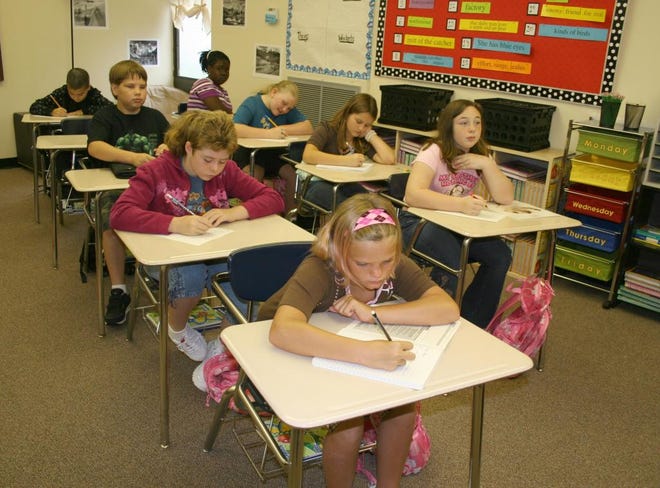 Students in Jordyn Davis' fifth-grade class had already started working in their notebooks by 8:10 a.m. the first day of school at Bryan County Elementary School. Davis asked the students to copy into their notebooks words from the dry-erase board until the morning announcements had concluded. (Allison Bennett Dyche/Bryan County Now)