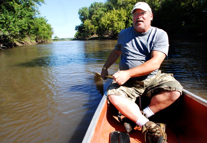 Rich Clark of the Freeport Canoe Company paddles down the Pecatonica River on August 7, 2008.