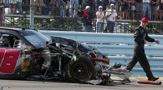 Charles Berch/The Associated PressNASCAR driver David Gilliland walks away from his car after a crash on the front stretch during the NASCAR Sprint Cup Series Centurion Boats at The Glen auto race Sunday in Watkins Glen, N.Y.