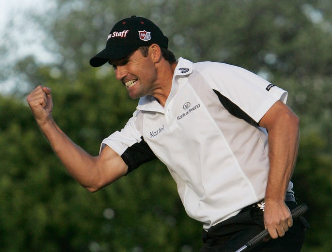 Padraig Harrington, of Ireland, celebrates after sinking a putt for par on 18 that gave him the win in theduring the final round of the 90th PGA Championship golf tournament Sunday, Aug. 10, 2008 at Oakland Hills Country Club in Bloomfield Township.