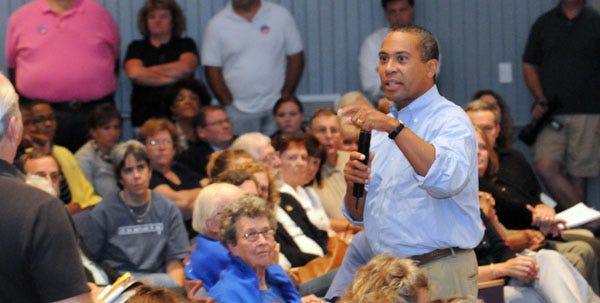 Gov. Deval Patrick fields a question from one of the roughly 250 people at his town hall meeting in Barnstable last night.