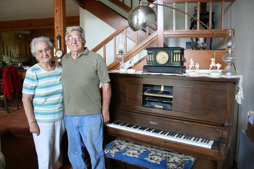 An ‘Italian’ Dispute in Siskiyou County – This antique Modelo player piano was first owned by the Vietti family, shopkeepers in Mount Shasta. The Dal Gallos bought it in the early 1960s for only $100. Now Vietti family relatives want the piano back, but according to a laughing Frank Dal Gallo, pictured here with his wife Vera, they haven’t yet “…come up with the money.”
