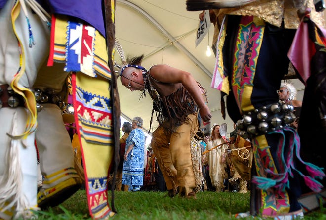 Pat "Three Crows" Crump of Norwich, of the Mohawk and Mohegan tribes, dances during the Grand Entry of the Mohegan Wigwam Festival at Fort Shantok in Uncasville Saturday, August 16, 2008.