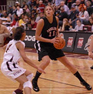 Prized recruit Elena Delle Donne, right, shown in January playing at the Spalding HoopHall Classic in Springfield, Mass., will not play basketball at UConn, the school announced Saturday.