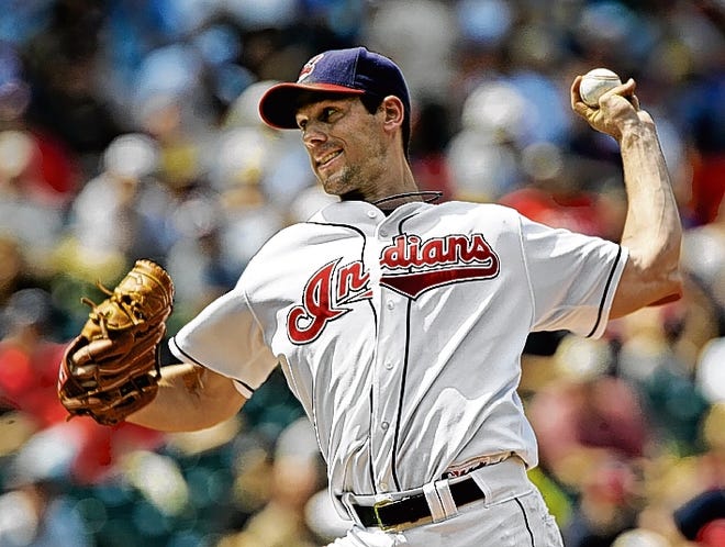 Cleveland Indians' Cliff Lee pitches against the Kansas City Royals in the seventh inning of a baseball game Thursday, Aug. 21, 2008, in Cleveland. Lee got his 18th win of the season as the Indians beat Kansas City 10-3. (AP Photo/Mark Duncan)
