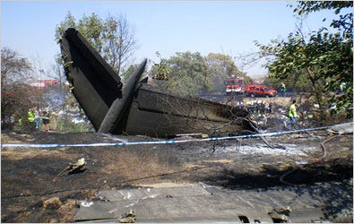The tail of the Spanair jet that crashed on takeoff in Madrid.