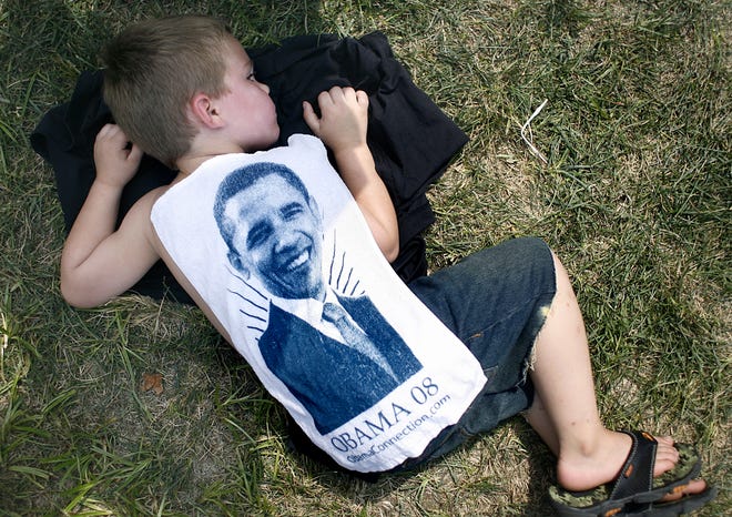 Aydn Anderson, 4, of Springfield rests on the grass during Barack Obama's appearance at the Old State Capitol in Springfield on Saturday, August 23, 2008.