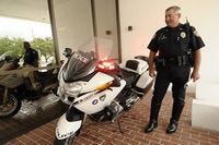 Winter Haven Police Officer Ken Nichols likes his new BMW R1200 RTP motorcycle he recently received. Officer Nichols had his bike on display at Winter Haven City Hall Monday evening. Monday, August 25, 2008