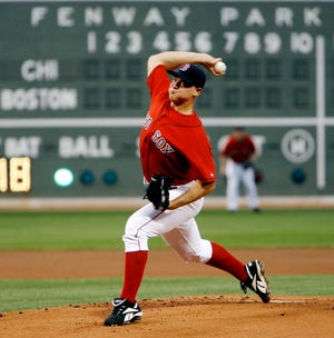Boston starting pitcher Michael Bowden delivers during his major- league debut against the Chicago White Sox.