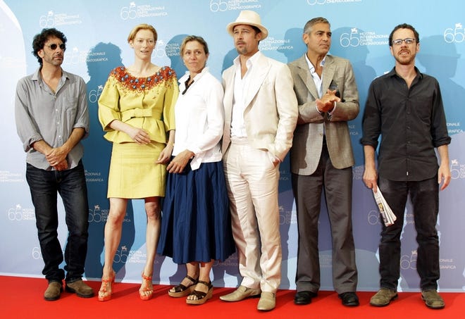 Joel Coen, left, Tilda Swinton, Frances McDormand, Brad Pitt, George Clooney 
and Ethan Coen attend the Venice Film Festival in Italy, where their latest 
movie, "Burn After Reading," will premiere Wednesday.