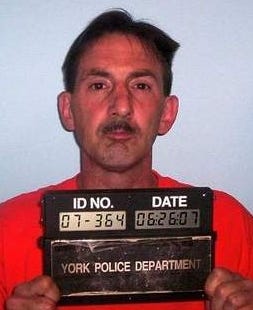 Courtesy photo
Richard Dalli, 50, of 90 Rogers Road in York, Maine, as he appeared in his police photo Tuesday.