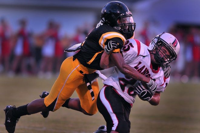 Defensive back JaQuincy Morris, left, and the Chesnee defense recorded their first shut out of the season on Thursday against Landrum at Chesnee.