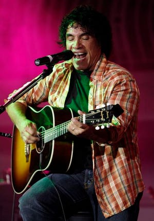 In this July 30, 2008 file photo, musician John Oates performs at the Sunset Marquis Hotel Villa Grand Opening featuring Gibson Through The Lens party in West Hollywood, Calif. Oates entertained an assembly of about 1,000 Monday, Sept. 8, 2008 at Pennsylvania's North Penn High School in Lansdale, 20 miles north of Philadelphia. Oates, an alumnus of the school, says he grew up there so long ago he remembers when jeans weren't allowed in school and "when the first McDonald's came."