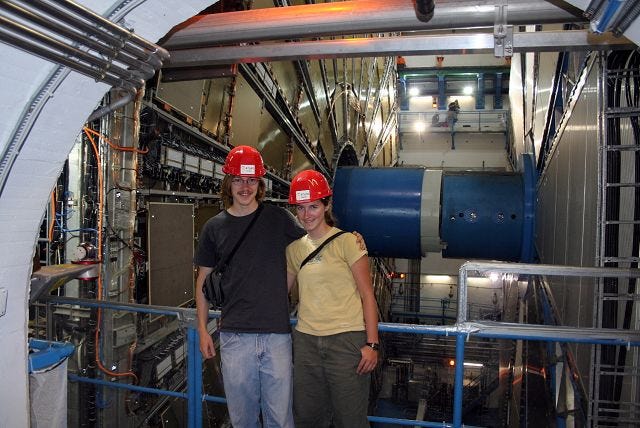 Courtesy photo
University of New Hampshire senior Austin Purves, left, poses in front of the ATLAS detector in Geneva, Switzerland. Purves wrote computer code for the detector, which is part of the Large Hadron Collider, the biggest particle accelerator ever constructed. With Purves is his girlfriend and fellow UNH senior, Melanie Schroer.
