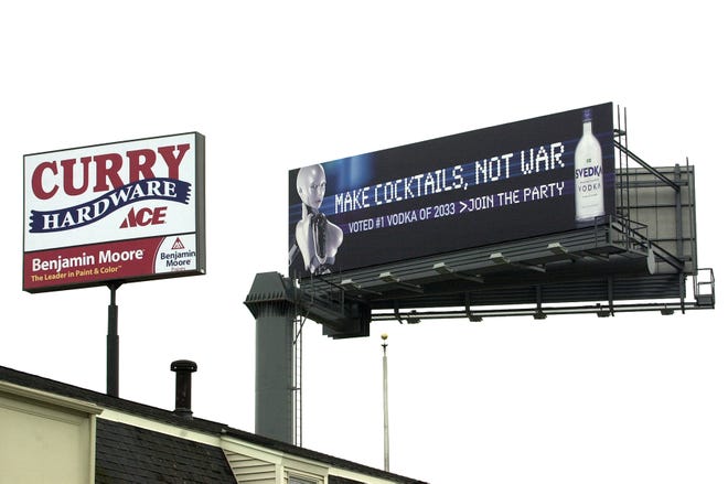 Billboard next to Curry Hardware and overlooking Rte. 3, on Copeland Street in West Quincy.