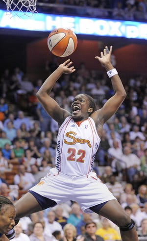 Sun guard Barbara Turner fights to get to the hoop during the first half of today’s WNBA game against the Mystics at Mohegan Sun Arena.