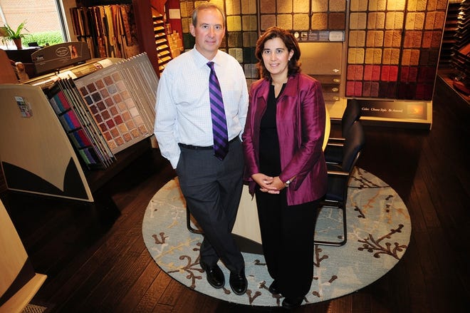 Jamie Hodge, left, and Mia Thompson, owners of Hodge Carpets in Spartanburg, gave their 5,000-square-foot showroom a "cozier" look so customers could get a better feel for their products.