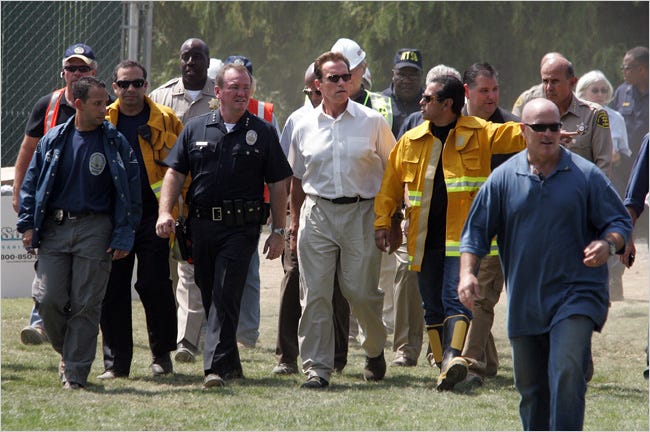 Gov. Arnold Schwarzenegger toured the scene in the San Fernando Valley on Saturday as the investigation continued.