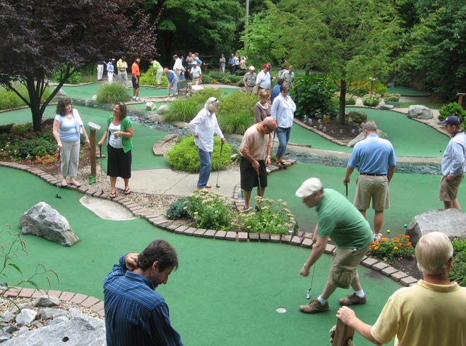 Golfers play Saturday in the fifth annual William W. Backus Hospital Mini Golf Tournament at Knolls and Holes Golf Course at Bozrah’s Odetah Campground.