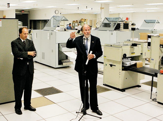 AP Photo/Mel Evans
 New Jersey State Treasurer R. David Rousseau, left, listens as Gov. Jon Corzine, former Goldman Sachs chairman, speaks Monday at a state check printing facility, in West Trenton. Corzine spoke about the effect the demise of Lehman Brothers and Merrill Lynch, along with other Wall Street woes, will have on New Jersey’s economy.