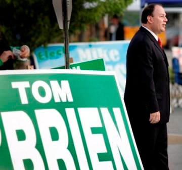 Tom O'Brien of Kingston outside the polls in Marshfield on election day. He won the Democratic primary for county treasurer.
