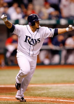 Dioner Navarro of the Tampa Bay Rays celebrates his game-winning RBI single in the bottom of the ninth Tuesday night against the Red Sox.