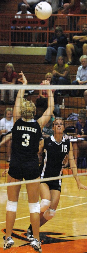 Ready to spike:?Washington senior Sarah McCoy, No. 16, receives a set from junior teammate Lindsey Boyer Thursday during the volleyball team’s two-game victory over Canton. The Lady Panthers host Limestone tonight.