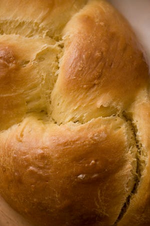 **FOR USE WITH AP LIFESTYLES**  Challah is seen in this Sunday, Sept. 7, 2008 photo. Challah, the egg-rich Jewish bread, is gorgeous to look at before tearing into it as is or using it to make French toast or bread pudding. (AP Photo/Larry Crowe)