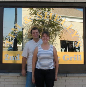 Home at last: Tim and Shelly Berger, owners of 2nd St. Bar & Grill, will welcome their first customers Friday following a Chillicothe Chamber of Commerce ribbon-cutting ceremony.
