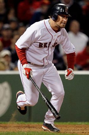 AP Photo
Boston Red Sox's Mark Kotsay heads to first after hitting an RBI double to drive in the go-ahead run during the eighth inning of Boston's 5-4 win over the Cleveland Indians at Fenway Park in Boston on Wednesday.